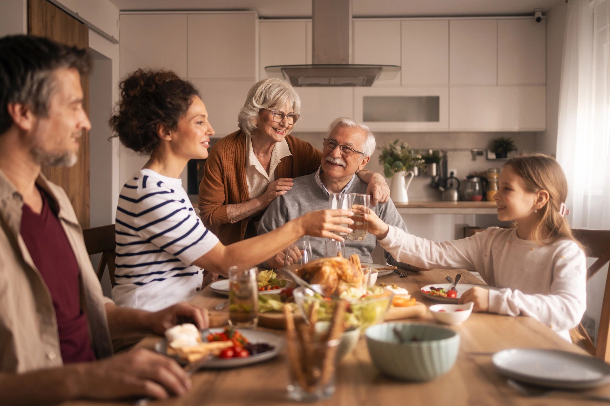 Family gathered together at home representing family-centred care